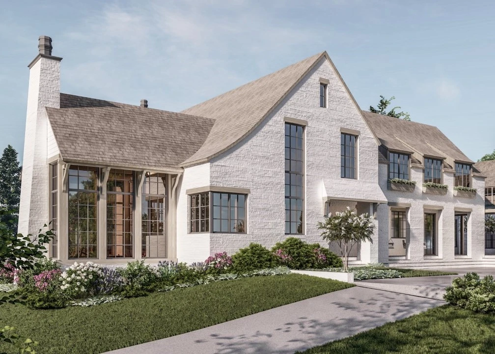 Modern farmhouse with white painted brick facade, pitched roof, timber-frame entry portico, and multi-pane windows.